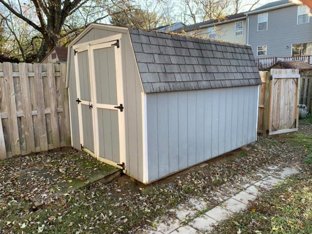 Old backyard shed being torn down and removed in Palm Beach Gardens